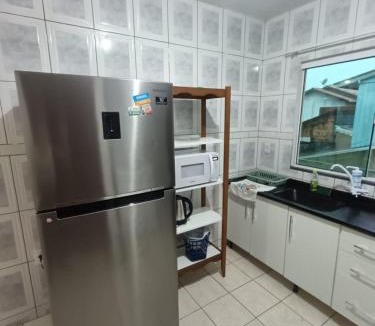 Palhoca Apartment | Apartamento simples com vista para a praça