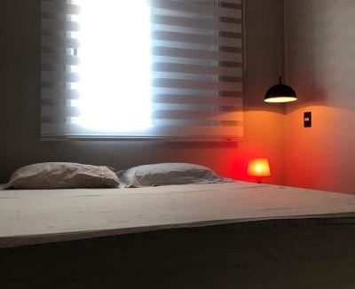 Estufa I Apartment | Apartamento Ubatuba - Ar Condicionado, Estacionamento, Elevador, Portaria 24h - WiFi Grátis! - Jardim das Palmeiras