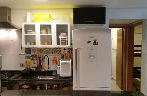 Estufa I Apartment | Apartamento Ubatuba - Ar Condicionado, Estacionamento, Elevador, Portaria 24h - WiFi Grátis! - Jardim das Palmeiras