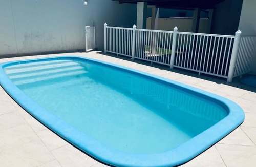 Barra de Ibiraquera Apartment | Apartment with two suites, two blocks from the sea and three from the lagoon.
