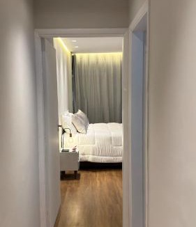Aparecida Apartment | Apto 711 - Elegância com vista parcial da Praia