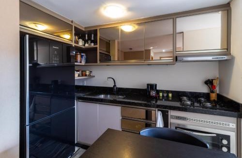 Garcia Apartment | Apto a 10 min da Vila Germânica, dois quartos, salas de estar e jantar, cozinha completa, sacada com churrasqueira, Wi-Fi, Piscina, academia, mercadinho 24 horas e Vaga de garagem
