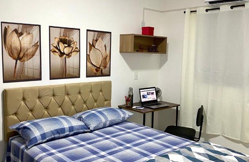 Centro Apartment | Apto aconchegante no centro perto do Shopping com 2 Quartos Casal ArCond WiFi 400M HomeOffice Cozinha Maq Lavar e Garagem em Dourados