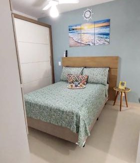 Umuarama Apartment | Apto Centro Ubatuba com Varanda Gourmet, Suíte, Piscina e Garagem Privativa Coberta