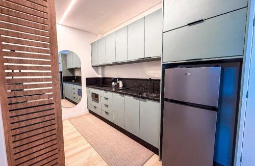 Santa Terezinha Apartment | Apto com 1 quarto e sacada com churrasqueira