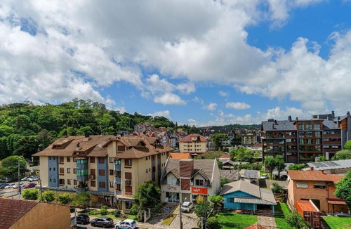 Floresta Apartment | Apto no Centro e Piscina aquecida by Achei Gramado
