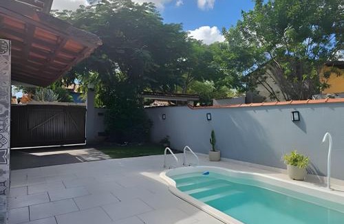 Itauna House | Ar-condicionado Área gourmet Próximo ao Surf Point