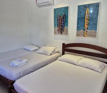 Itauna House | Ar-condicionado Área gourmet Próximo ao Surf Point
