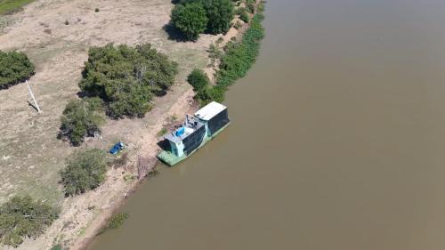Carvoalzinho Boat Rental | Barco Casa Pantanal Toca da Onça