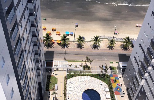 Mongagua Apartment | Beachfront apartment with pool for families, pets allowed.