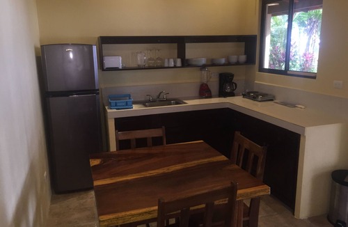 Bejuco Apartment | BEACHFRONT Sand Unit - One Bdrm, living area, bath, kitchen and beautiful pool