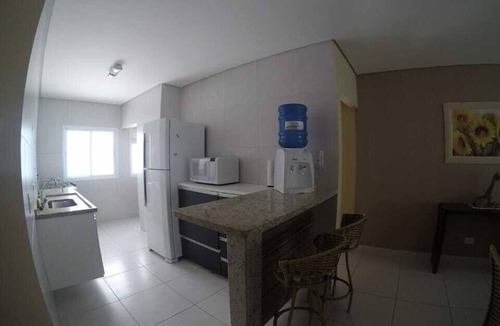 Praia Grande Apartment | Beautiful apartment with excellent ocean views, featuring hot and cold swimming pools.
