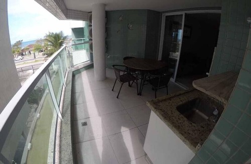 Praia Grande Apartment | Beautiful apartment with excellent ocean views, featuring hot and cold swimming pools.