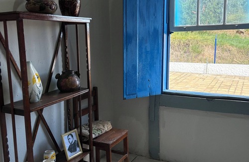 Tres Coracoes Cottage | Beautiful Centennial Farm in Três Corações