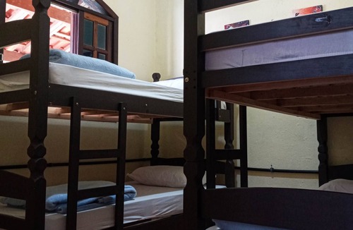 Itamambuca Cabin | Bed in shared room