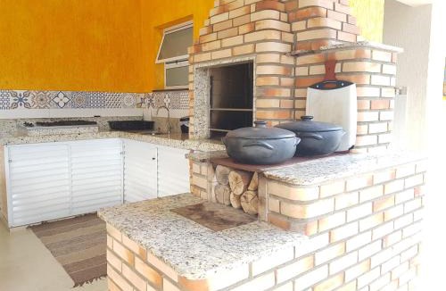 Lagoinha House | Bela Casa Terrea na Praia da Lagoinha Ubatuba com Piscina, Ar Condicionado, Churrasqueira e Forno a Lenha