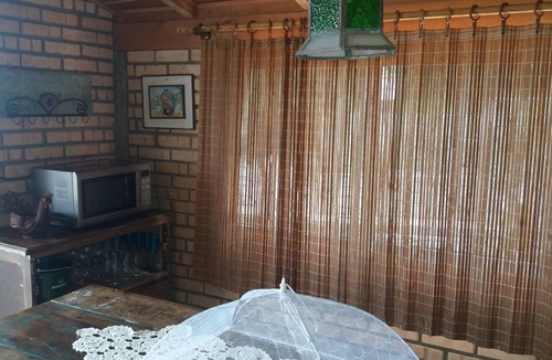 Zimbros House | Bombinhas, Zimbros Beach, beachfront. Right on the sand! There is no shortage of water.