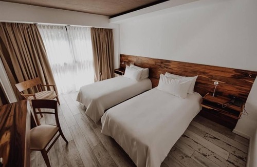 Rio Cuarto Hotel | Breathtaking Modern Oasis: Indoor Heated Pool, Outdoor Pool & Free Breakfast