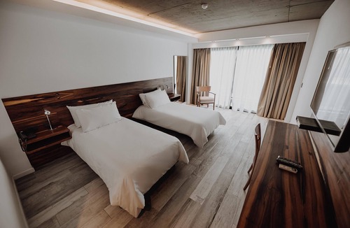 Rio Cuarto Hotel | Breathtaking Modern Oasis: Indoor Heated Pool, Outdoor Pool & Free Breakfast