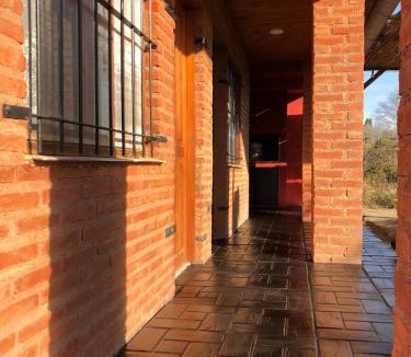 Villa Amancay House | CABAÑAS FENIX con EL ARROYO AMBOY RODEANDO LA PROPIEDAD reservar con 24 hs de anticipación