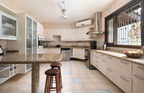 Florianopolis House | Cacupé Refuge: 180° Ocean View · Pool, Garden & Barbecue Area