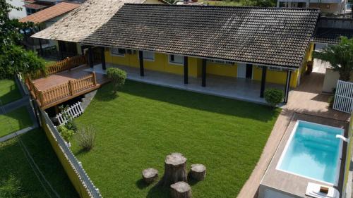 Sao Pedro da Aldeia House | Casa 4 quartos, 2 suítes, piscina e acessibilidade - Frente para a lagoa
