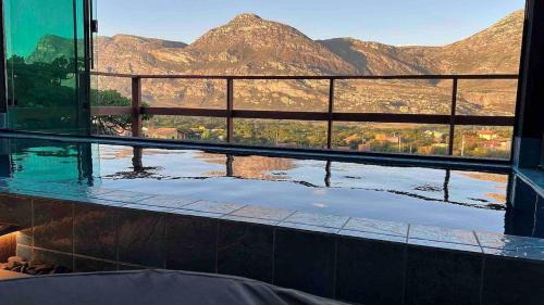 Lapinha da Serra House | Casa 422 - Loft Bromélia