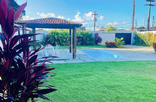 Aruana House | Casa aconchegante com piscina e muito espaço verde