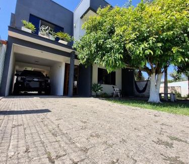 Tramandai House | Casa ampla com piscina próxima ao mar
