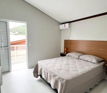 Toninhas House | CASA AQUAMARINE