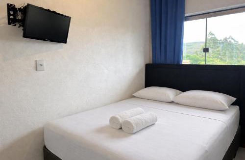 Lavras Novas Apartment | Casa com 2 suítes e varanda em Lavras Novas