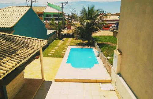 Unamar House | Casa com 3 suítes em Cabo Frio com piscina há poucos passos do Mar!