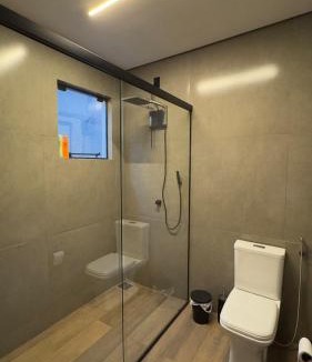 Palhoca House | Casa com 4 suítes, piscina aquecida e sauna