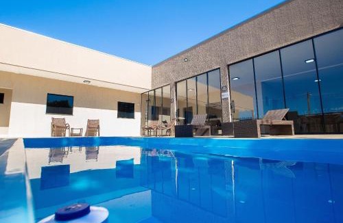 Jardim Paraiso House | Casa com 5 suítes próximo ao lago Corumbá