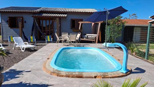 Curumim House | Casa com piscina aquecida, 3 quartos e 3 camas extras