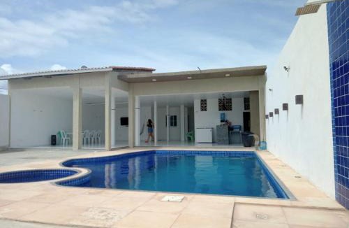 Aracati House | Casa com Piscina, hidromassagem e churrasqueira.