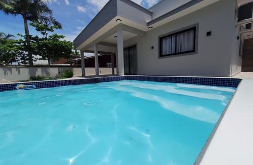 Palhoca House | Casa com piscina praia da Pinheira - Brisa das Amendoeiras