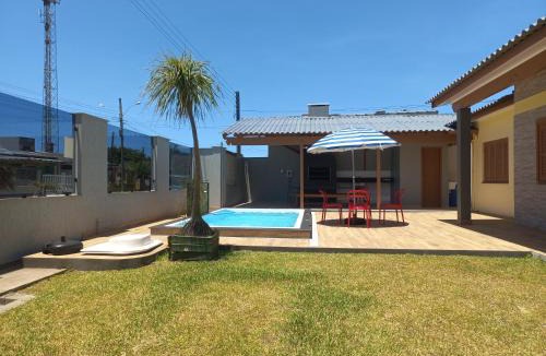 Capao da Canoa House | Casa Com Quatro Dormitórios, Pertinho Do Mar Em Capão Da Canoa