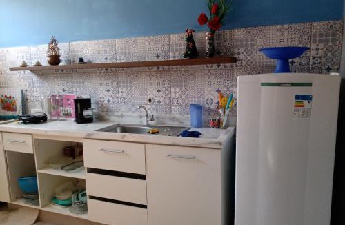 Palmeiras House | Casa conceito aberto aconchegante, perto de tudo e com garagem 64m2