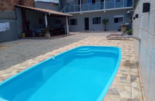 Taquaral House | Casa de 4 suites com piscina, próxima a praias e do centro de Ubatuba