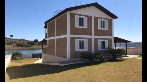 Nova Era House | Casa de Campo às margens do lago de furnas