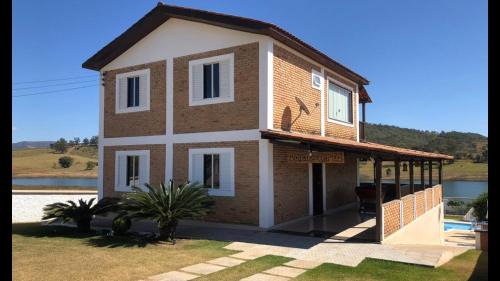 Nova Era House | Casa de Campo às margens do lago de furnas