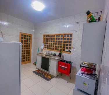 Aparecida House | Casa de Frente com Maria