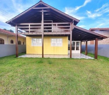 Ibiraquera House | Casa de frente para Lagoa de Ibiraquera com piscina e banheira