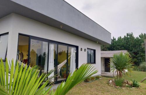 Centro House | Casa de Praia a 550m da praia de Balneário Rosa do Mar e 350m da Lagoa da Tapera.