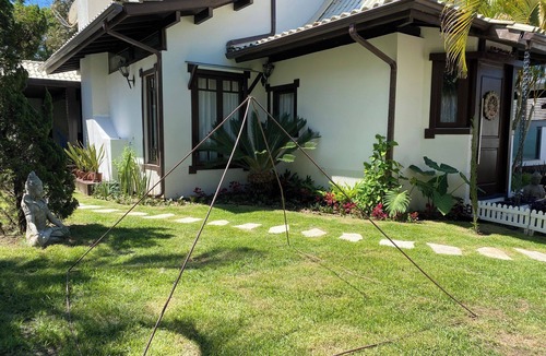 Porto da Lagoa House | Casa de Praia com Trilha Privativa em Condomínio Fechado