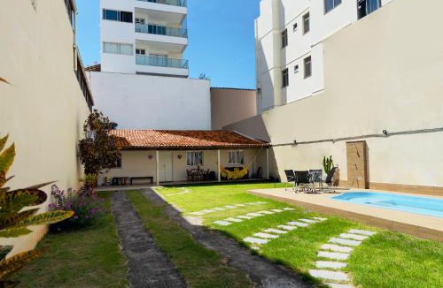 Praia do Morro Apartment | Casa de Praia com Piscina e Churrasqueira a 280m da Praia do Morro - 3 quartos com Ar Condicionado, sendo 2 suítes- Quintal amplo, ideal para famílias
