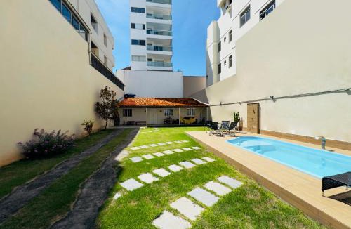Praia do Morro Apartment | Casa de Praia com Piscina e Churrasqueira a 280m da Praia do Morro - 3 quartos com Ar Condicionado, sendo 2 suítes- Quintal amplo, ideal para famílias