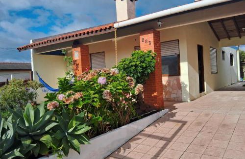 Capao da Canoa House | Casa de Praia em Capão da Canoa-RS