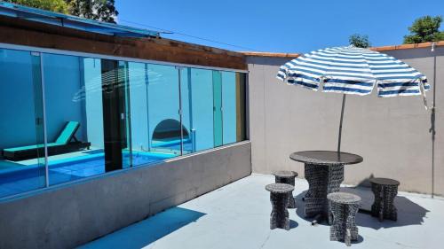 Rio do Sul House | Casa de sítio com piscina coberta, sala de jogos e fogão a lenha